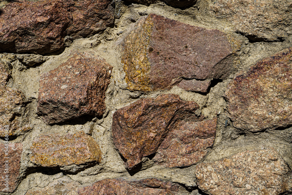Masonry. Fragment of a wall from a large granite Masonry. Fragment of a wall from a large granite