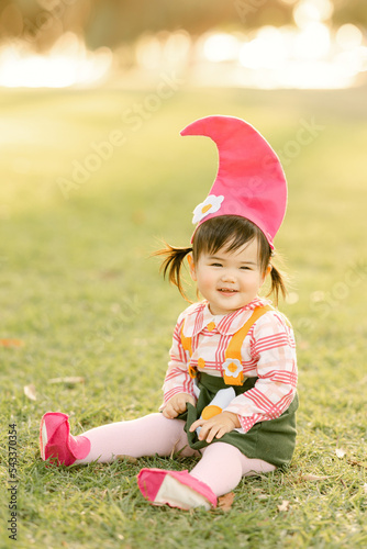 little girl playing in the park photo