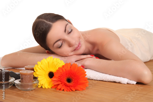 woman relaxing in spa on white