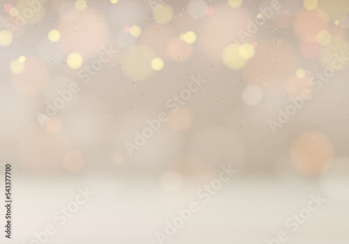 Christmas festive shimmering blurred golden glitter and light bokeh on beige background luxury style
