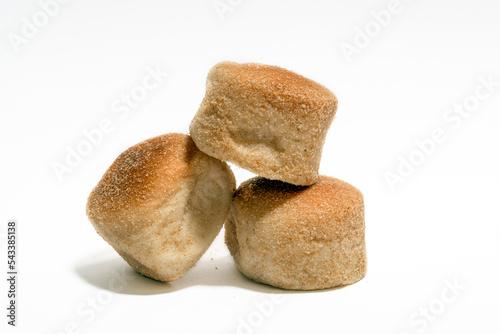 Pandesal or pan de sal is a Filipino traditional bread usually eaten during breakfast or afternoon snack. Isolated in white photo