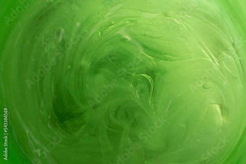 green thick gel background with air bubbles