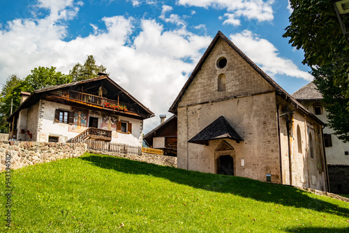 View on the rectory and church of San Martino in Fiera di Primiero, Trentino Alto Adige - Italy