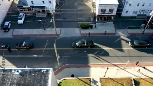 DRONE FUNERAL PROCESSION OF HEARSE AND MOTORCYCLES photo