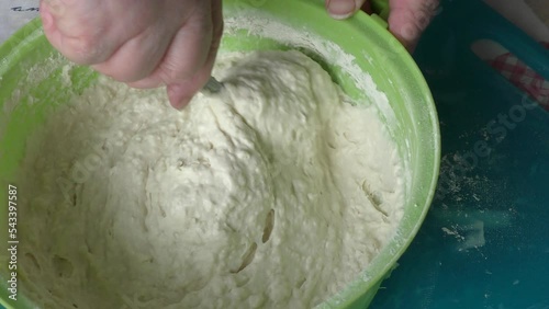 the cook kneads the dough for pies. healthy food concept