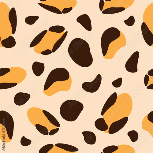 seamless leopard background in orange and brown tones on a beige background