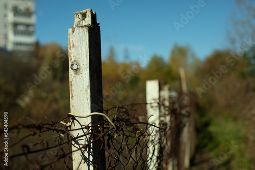 Fence in detail. Fence around house. Barrier for outsiders.