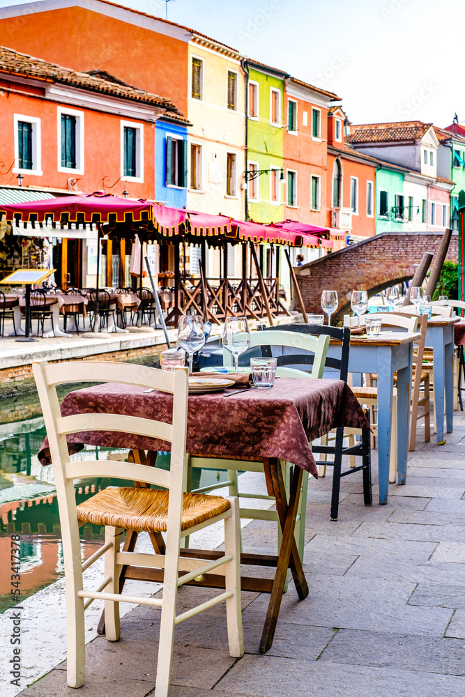 typical italian sidewalk cafe - restaurant