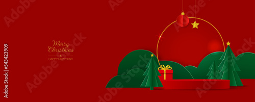 Merry Christmas and Happy New Year banner. Red podium with green christmas tree and gift box in paper cut style. Vector illustration.