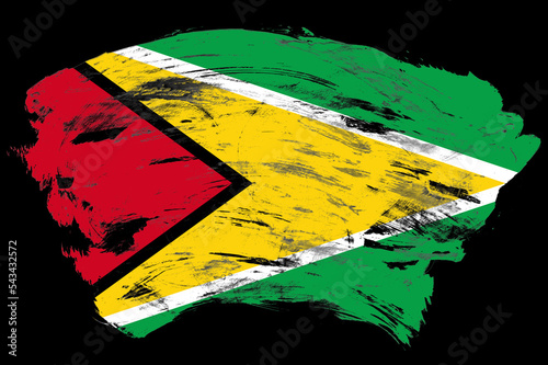 Guyana flag on distressed black stroke brush background