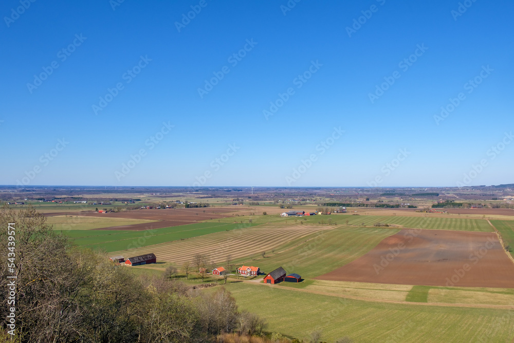 Aerial view of rural landscape in spring with a farm