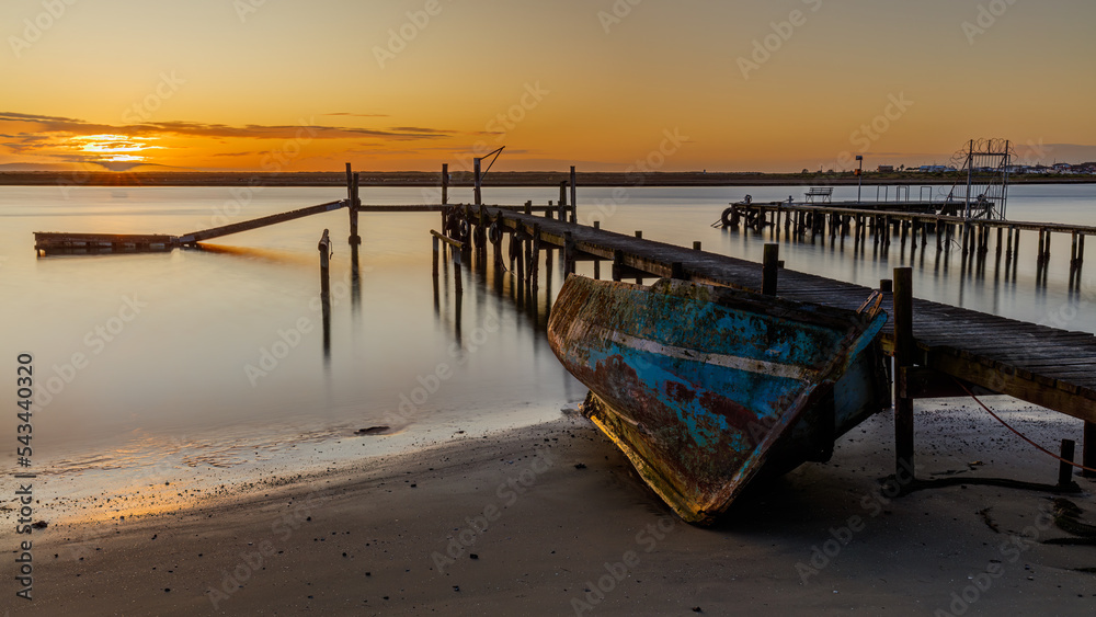 Dilapidated Old blue boat at Velddrif between the fishing jetties Dilapidated Old blue boat at Velddrif between the fishing jetties