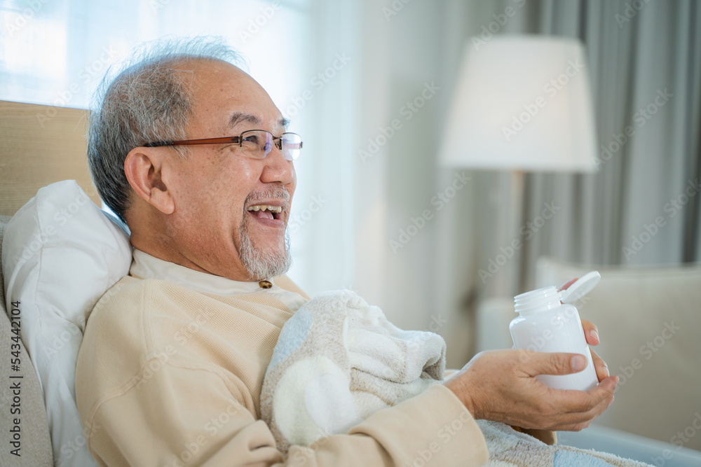 Senior man taking medicine at home,Medicine, Health care and people concept. Senior man taking medicine at home,Medicine, Health care and people concept.
