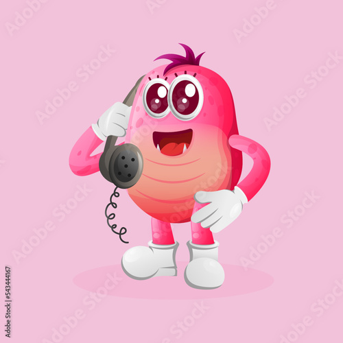 Cute pink monster pick up the phone, answering phone calls