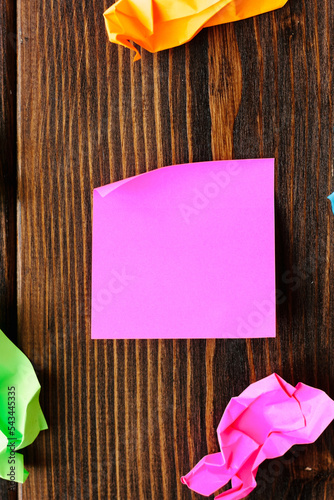 purple sticker on a wooden ...