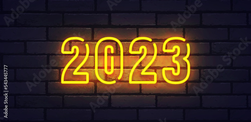 2023 Happy New Year neon logo text design. 2023 neon number design template. Vector illustration photo