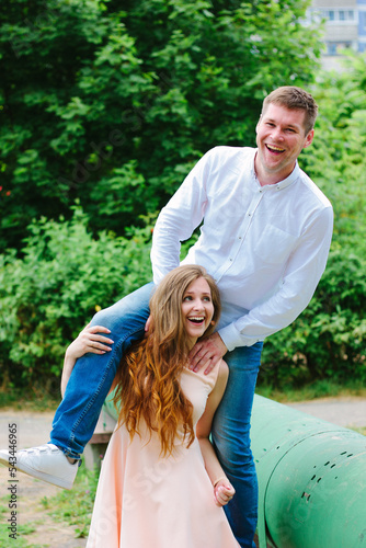 Happy couple - girl with bo...