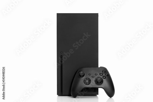 Black next generation game console and controller.
