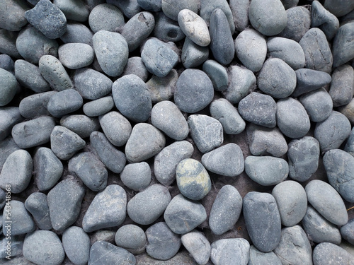 Obraz na plátne Close-up shot of a large pile of gray stones.