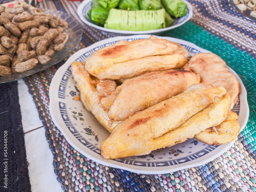 traditional local indonesian food. fried bananas. Made from banana fruit fried in crispy flour traditional local indonesian food. fried bananas. Made from banana fruit fried in crispy flour