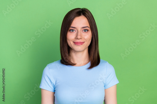 Photo of young attractive cute woman confident smile business manager good mood isolated on green color background