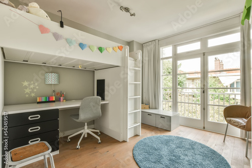 Children's room with a bunk bed in a bright modern flat photo