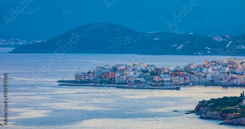 Sunset over Agios Nikolaus. Agios Nikolaos, Crete, Greece, day to night, time lapse.