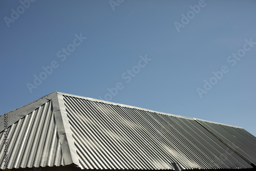 Roof is made of metal. Steel roof. Details of building.