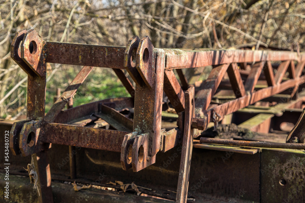old rusty railway equipment at an abandoned station