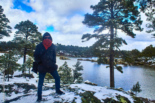 lake on winter with trees covered of snow in arareco lake, creel chihuahua  photo