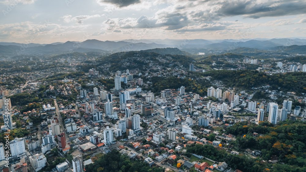 aerial image of Blumenau city, Santa Catarina, southern Brazil, buildings, main streets, vegetation and sunny day