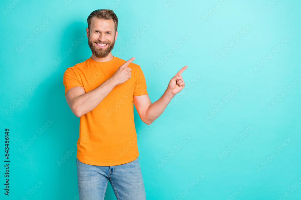 Photo of optimistic brown hairdo guy index promo wear orange t-shirt isolated on teal color backgroiund Photo of optimistic brown hairdo guy index promo wear orange t-shirt isolated on teal color backgroiund