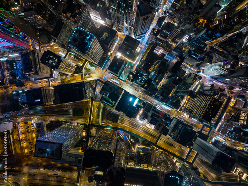 Top down view of the compact city in central of Hong Kong in the evening © leungchopan