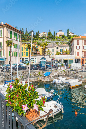 The beautiful port of Menaggio with the colorful houses that are reflected on the water
