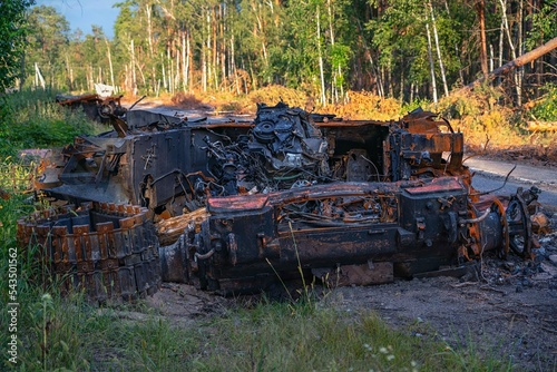 War in Ukraine, Remains of Destroyed and burned by Ukrainian army,  russian battle tank of the Russian invaders after counteroffensive 
 photo