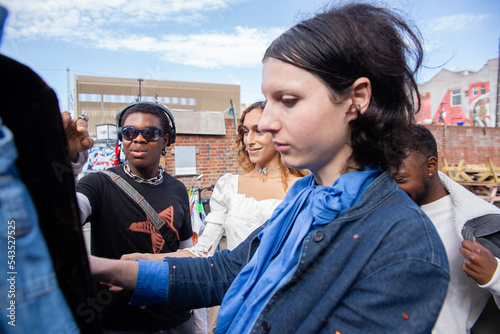 A group of transgender friends at a vintage market.