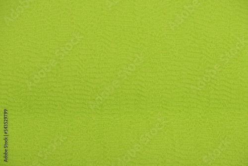 Lime green fabric and pattern background.
