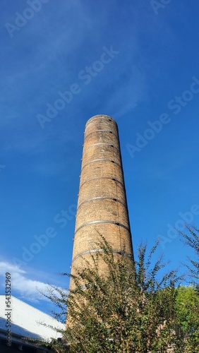 Low-angle vertical of Almeria - La Magnesita tower against a clear sky