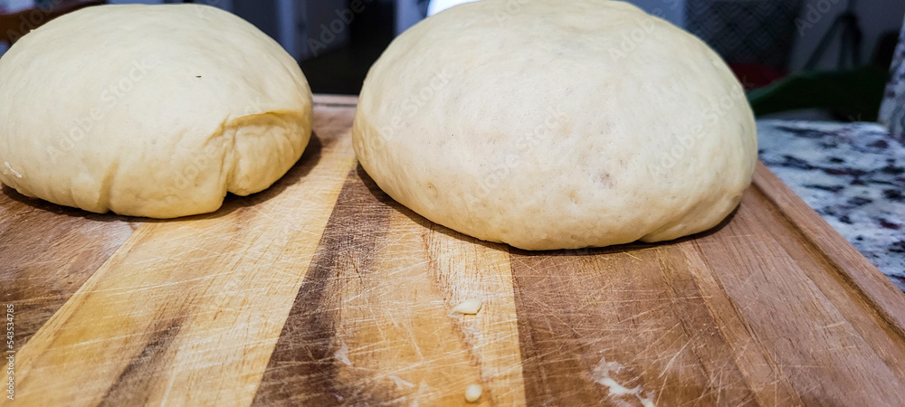 bakery of homemade breads in production, bread dough StockFoto Adobe