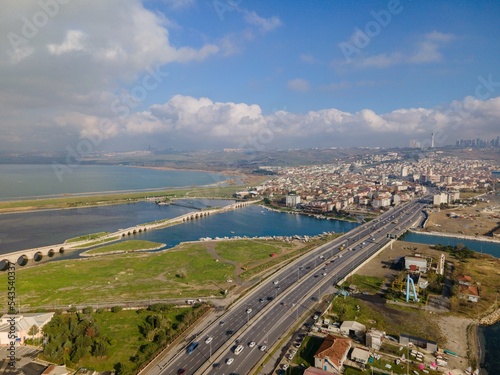 Aerial view of the Mimarsinan bridge and cityscape in a sunny day photo