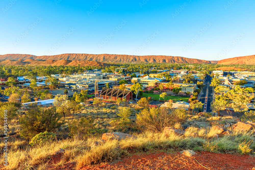 Anzac Hill Memorial lookout: aerial view of Alice Springs in Australia. Located in Red Centre desert with Macdonnell ranges of Northern Territory.