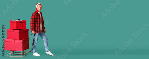 Young man with Christmas gi...