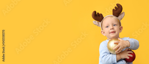 Cute little baby with deer ...