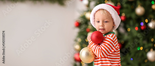 Cute little baby in Santa h...