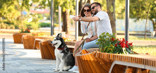 Young couple taking selfie ...