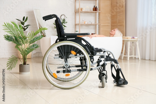 Wheelchair in bathroom of m...