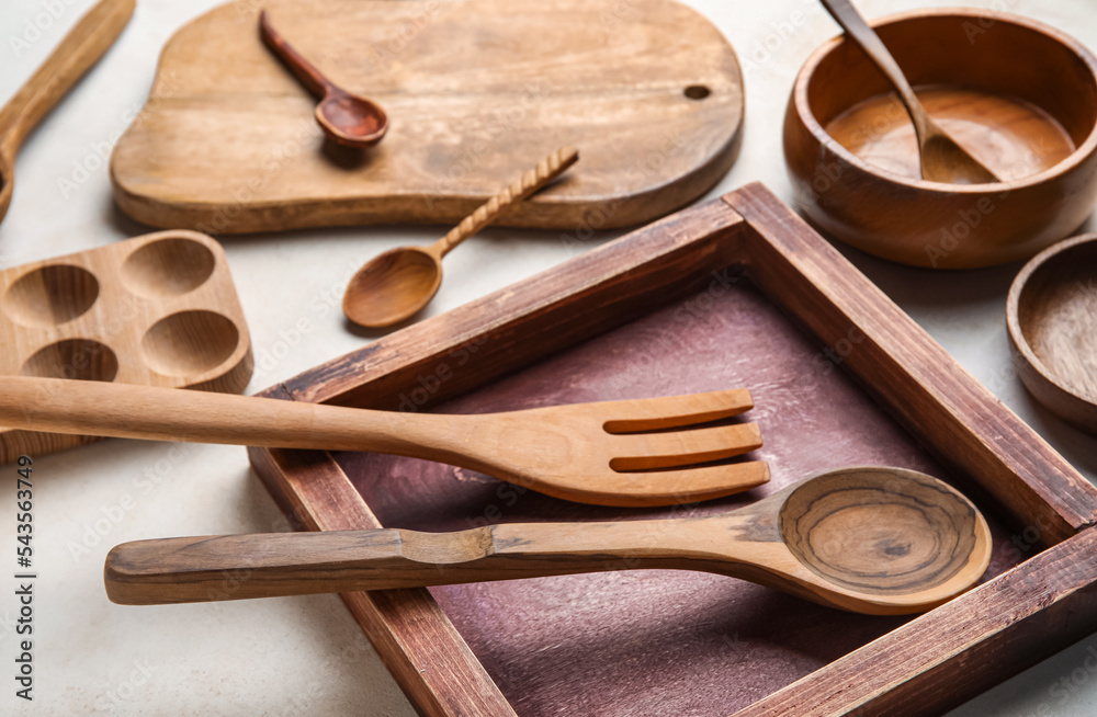 Wooden cooking utensils on white background Wooden cooking utensils on white background