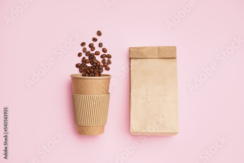 Paper cup with coffee beans...