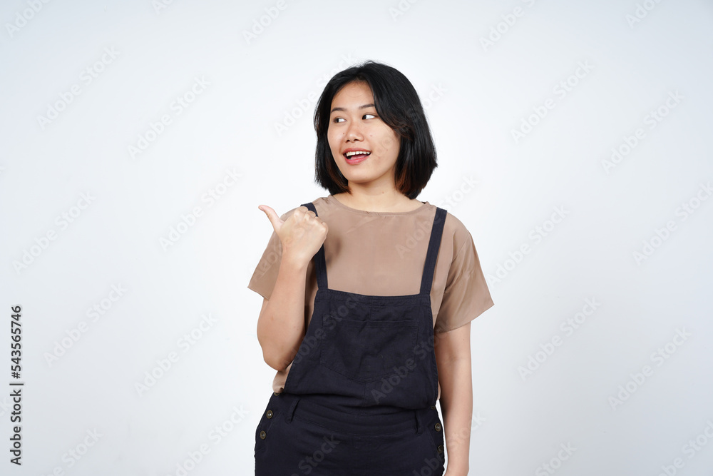 Presenting and Pointing Side Product Using Thumb of Beautiful Asian Woman Isolated On White Presenting and Pointing Side Product Using Thumb of Beautiful Asian Woman Isolated On White
