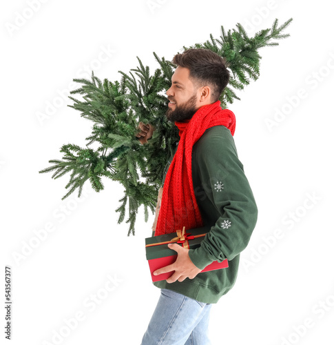 Happy young man carrying ch...